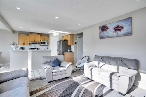 140 Saddlehorn Crescent Ne, Calgary, AB - Indoor Photo Showing Living Room