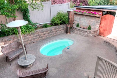 1604 Scotland Street Sw, Calgary, AB - Outdoor With In Ground Pool With Deck Patio Veranda