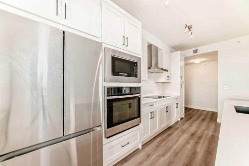 2409-55 Lucas Way Nw, Calgary, AB - Indoor Photo Showing Kitchen With Stainless Steel Kitchen