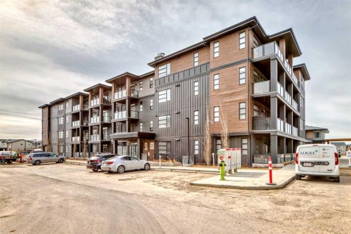 2409-55 Lucas Way Nw, Calgary, AB - Outdoor With Balcony With Facade