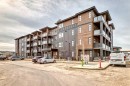 2409-55 Lucas Way Nw, Calgary, AB  - Outdoor With Balcony With Facade 
