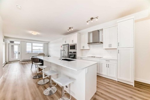 2409-55 Lucas Way Nw, Calgary, AB - Indoor Photo Showing Kitchen With Stainless Steel Kitchen With Upgraded Kitchen