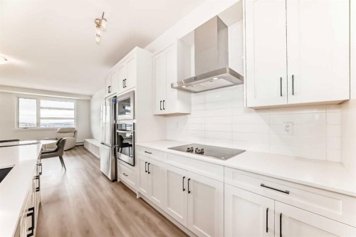 2409-55 Lucas Way Nw, Calgary, AB - Indoor Photo Showing Kitchen With Upgraded Kitchen