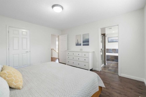 29 Sunset Close, Cochrane, AB - Indoor Photo Showing Bedroom