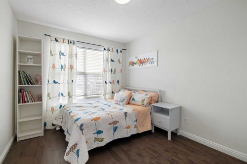 29 Sunset Close, Cochrane, AB - Indoor Photo Showing Bedroom