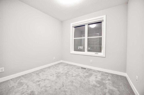 917 Crestridge Common Sw, Calgary, AB - Indoor Photo Showing Other Room