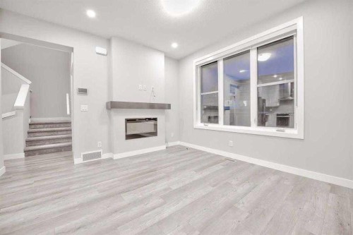 917 Crestridge Common Sw, Calgary, AB - Indoor With Fireplace