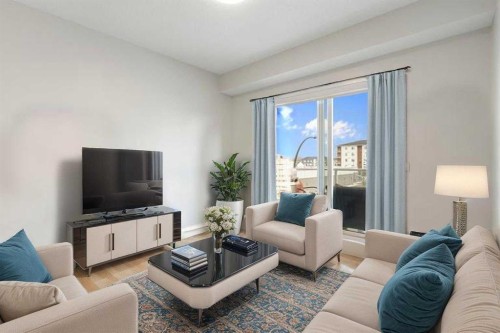 308-80 Carrington Plaza Nw, Calgary, AB - Indoor Photo Showing Living Room