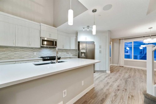 26 Howse Row Ne, Calgary, AB - Indoor Photo Showing Kitchen With Double Sink With Upgraded Kitchen