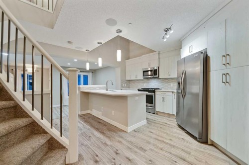 26 Howse Row Ne, Calgary, AB - Indoor Photo Showing Kitchen With Stainless Steel Kitchen With Upgraded Kitchen
