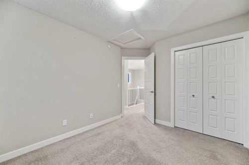 26 Howse Row Ne, Calgary, AB - Indoor Photo Showing Other Room