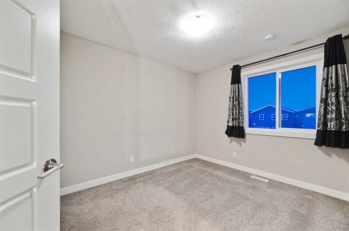 26 Howse Row Ne, Calgary, AB - Indoor Photo Showing Other Room