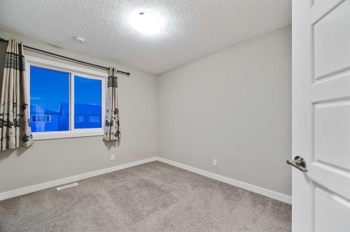 26 Howse Row Ne, Calgary, AB - Indoor Photo Showing Other Room