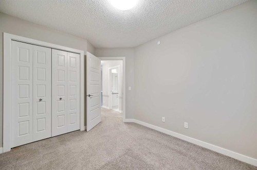 26 Howse Row Ne, Calgary, AB - Indoor Photo Showing Other Room