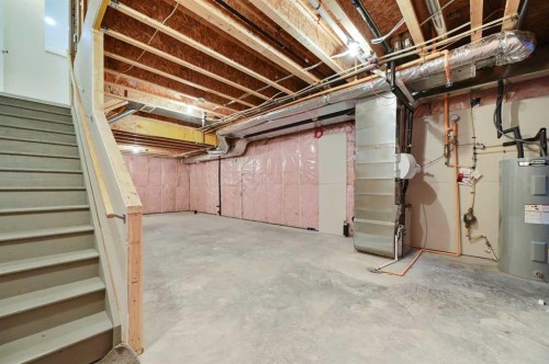 26 Howse Row Ne, Calgary, AB - Indoor Photo Showing Basement