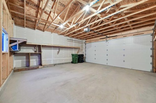 26 Howse Row Ne, Calgary, AB - Indoor Photo Showing Garage