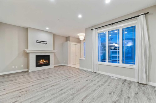 26 Howse Row Ne, Calgary, AB - Indoor With Fireplace
