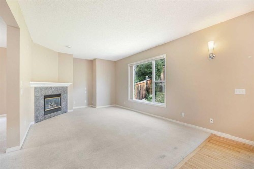72 Rockyledge Crescent Nw, Calgary, AB - Indoor Photo Showing Other Room With Fireplace