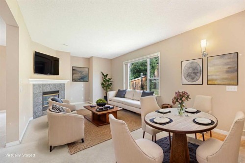 72 Rockyledge Crescent Nw, Calgary, AB - Indoor With Fireplace