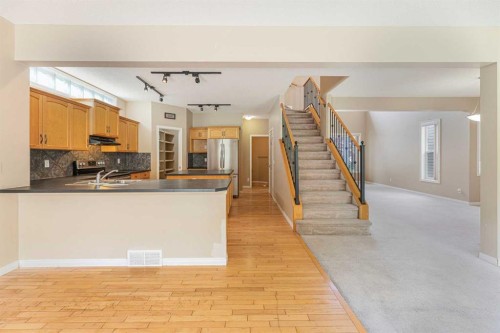 72 Rockyledge Crescent Nw, Calgary, AB - Indoor Photo Showing Kitchen With Double Sink