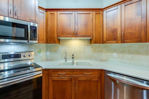 534-10 Discovery Ridge Close Sw, Calgary, AB - Indoor Photo Showing Kitchen With Double Sink