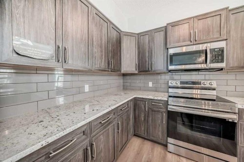 401-250 Fireside View, Cochrane, AB - Indoor Photo Showing Kitchen