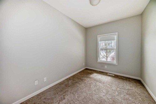 401-250 Fireside View, Cochrane, AB - Indoor Photo Showing Other Room