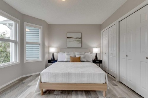 910 Prairie Sound Circle Nw, High River, AB - Indoor Photo Showing Bedroom