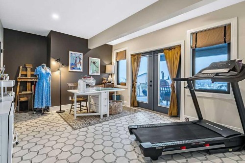 10 Westmount Point, Okotoks, AB - Indoor Photo Showing Gym Room