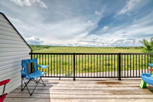 1703 Jumping Pound Common, Cochrane, AB - Outdoor With Deck Patio Veranda