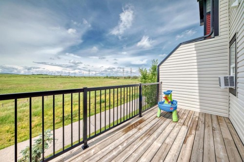 1703 Jumping Pound Common, Cochrane, AB - Outdoor With Deck Patio Veranda With Exterior