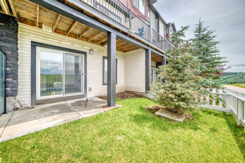 1703 Jumping Pound Common, Cochrane, AB - Outdoor With Deck Patio Veranda