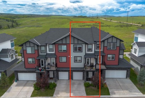 1703 Jumping Pound Common, Cochrane, AB - Outdoor With Facade