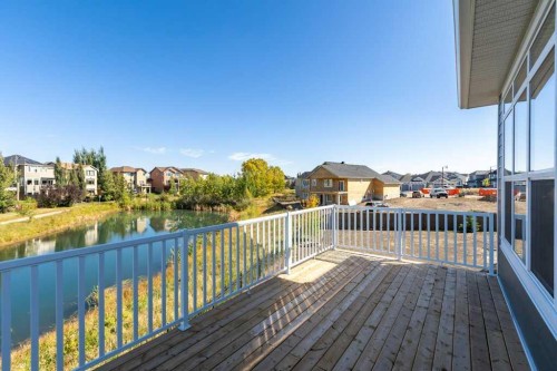 108 Monterey Bay Se, High River, AB - Outdoor With Body Of Water With Deck Patio Veranda