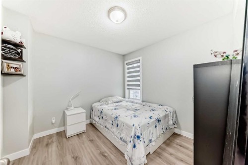 246 New Brighton Mews Se, Calgary, AB - Indoor Photo Showing Bedroom