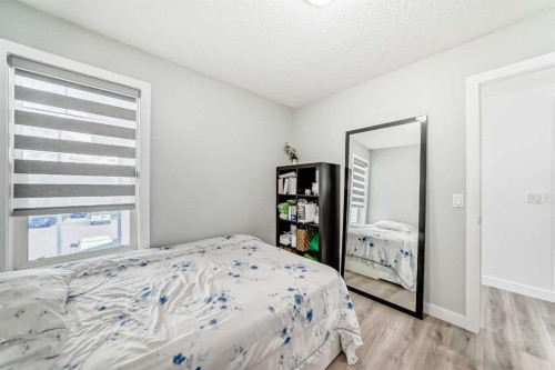 246 New Brighton Mews Se, Calgary, AB - Indoor Photo Showing Bedroom