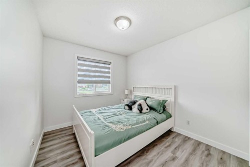 246 New Brighton Mews Se, Calgary, AB - Indoor Photo Showing Bedroom