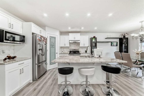 246 New Brighton Mews Se, Calgary, AB - Indoor Photo Showing Kitchen With Stainless Steel Kitchen With Upgraded Kitchen