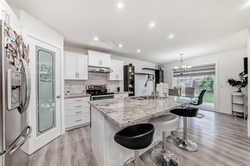 246 New Brighton Mews Se, Calgary, AB - Indoor Photo Showing Kitchen With Stainless Steel Kitchen With Upgraded Kitchen