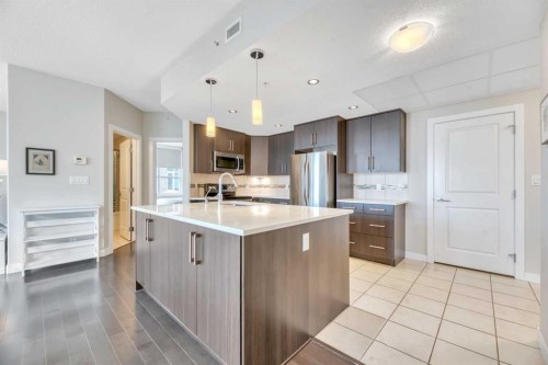 410-24 Varsity Estates Circle Nw, Calgary, AB - Indoor Photo Showing Kitchen With Stainless Steel Kitchen With Upgraded Kitchen