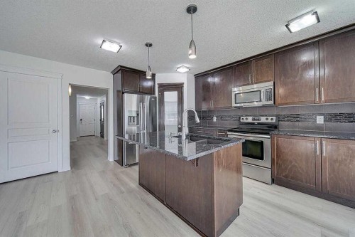 106 Sage Meadows Way Nw, Calgary, AB - Indoor Photo Showing Kitchen With Upgraded Kitchen