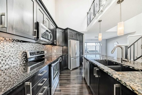48 Auburn Bay Crescent Se, Calgary, AB - Indoor Photo Showing Kitchen With Stainless Steel Kitchen With Upgraded Kitchen