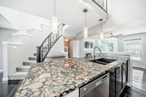48 Auburn Bay Crescent Se, Calgary, AB - Indoor Photo Showing Kitchen With Double Sink With Upgraded Kitchen
