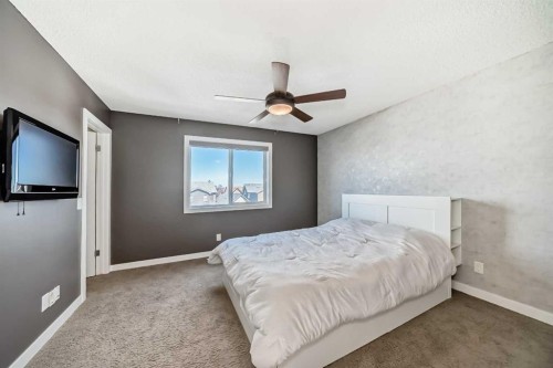 48 Auburn Bay Crescent Se, Calgary, AB - Indoor Photo Showing Bedroom