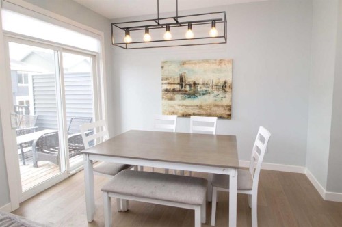 103 Sunrise Common, Cochrane, AB - Indoor Photo Showing Dining Room