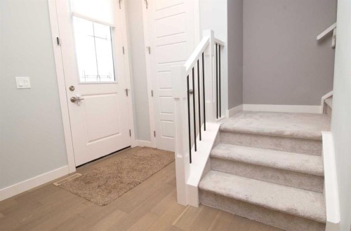 103 Sunrise Common, Cochrane, AB - Indoor Photo Showing Other Room