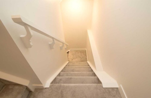 103 Sunrise Common, Cochrane, AB - Indoor Photo Showing Other Room