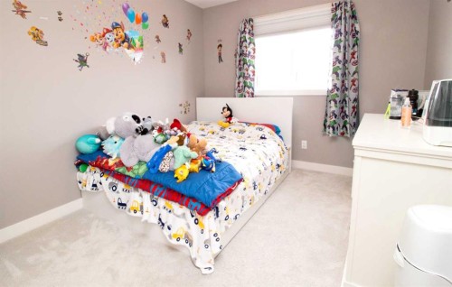 103 Sunrise Common, Cochrane, AB - Indoor Photo Showing Bedroom