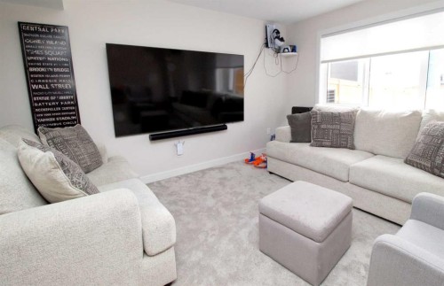 103 Sunrise Common, Cochrane, AB - Indoor Photo Showing Living Room