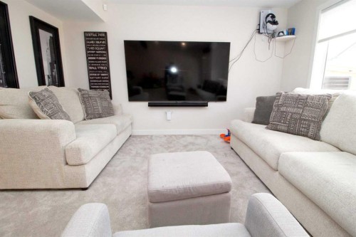 103 Sunrise Common, Cochrane, AB - Indoor Photo Showing Living Room